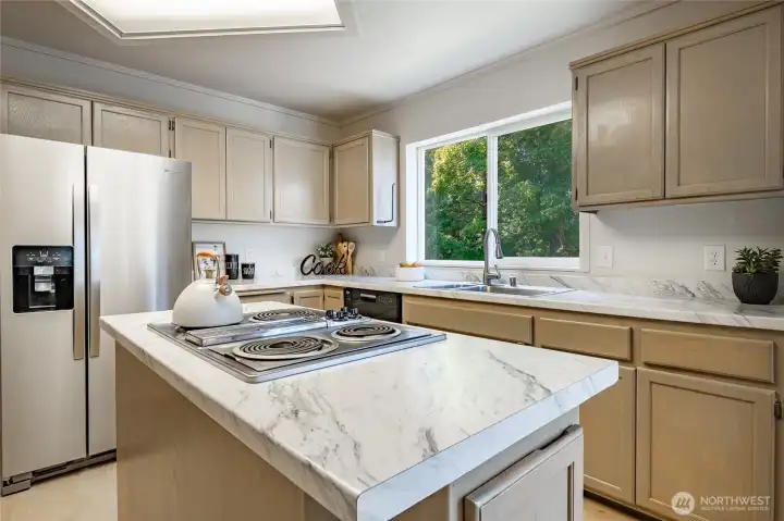 Peaceful views of the greenspace and wildlife from your kitchen sink