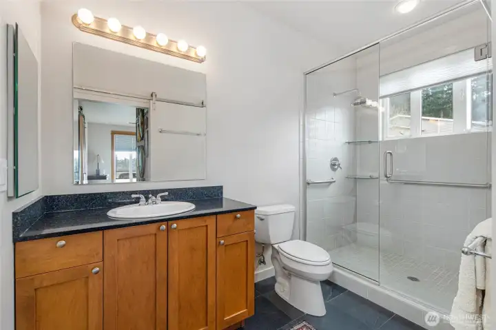 Spacious, luminous  and well appointed primary bathroom.