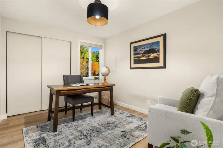 Second bedroom on the main floor makes a flexible den or office