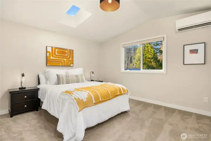 Third upstairs bedroom with vaulted ceiling and skylight