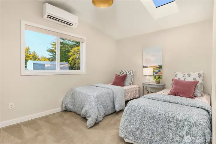 Fourth upstairs bedroom also vaulted with a skylight