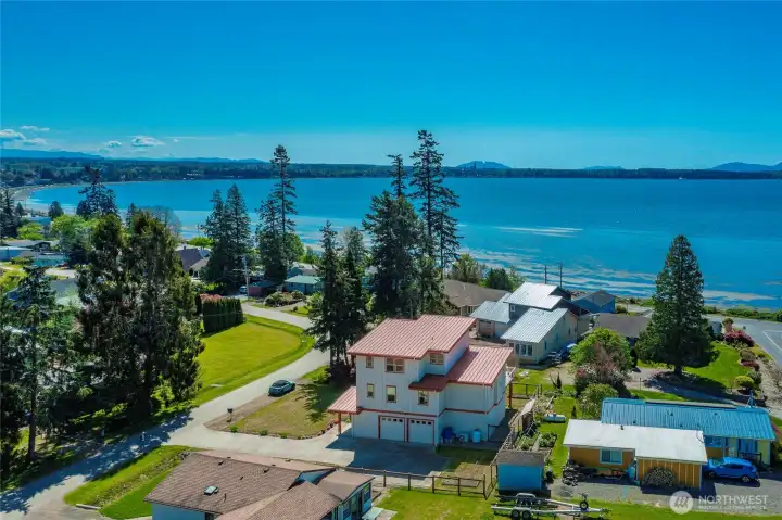 Home has metal roof, hardi siding, composite decking, heat pumps and gas fireplace