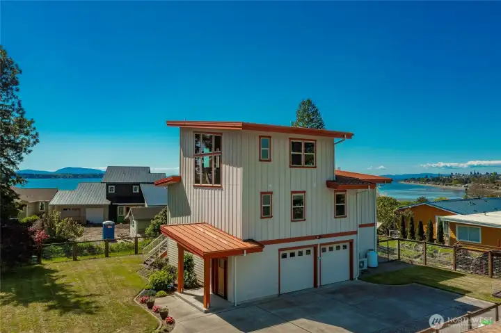 Very clean and neat property with fence and dog run. Covered front entry. There are three heat pump units and a gas fireplace.