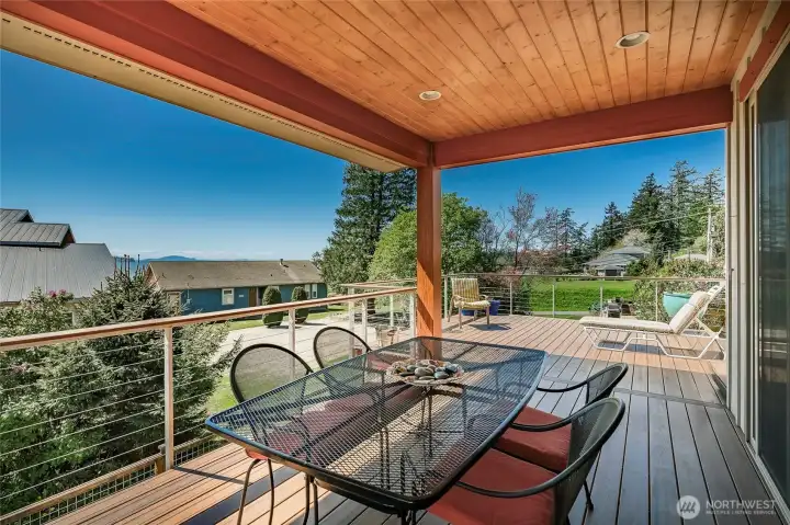 Very special composite deck area with covered knotty pine ceiling, led lights, 9 inch beams and the uncovered area great for entertaining and barbequing.