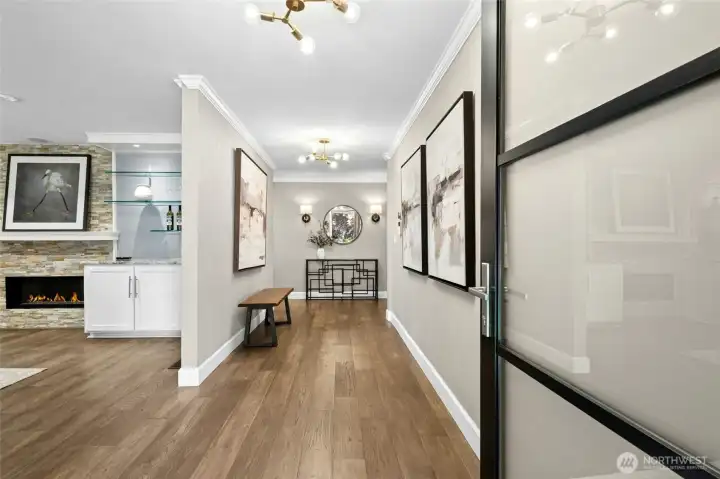 The open sightlines offer a seamless flow between the living spaces while maintaining a calm, welcoming feel.