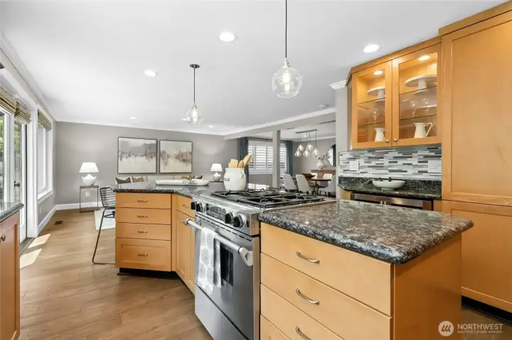 Open sightlines and generous workspace make the heart of the home feel both functional and connected.