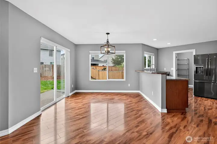 Dining room off the kitchen with slider out to the back