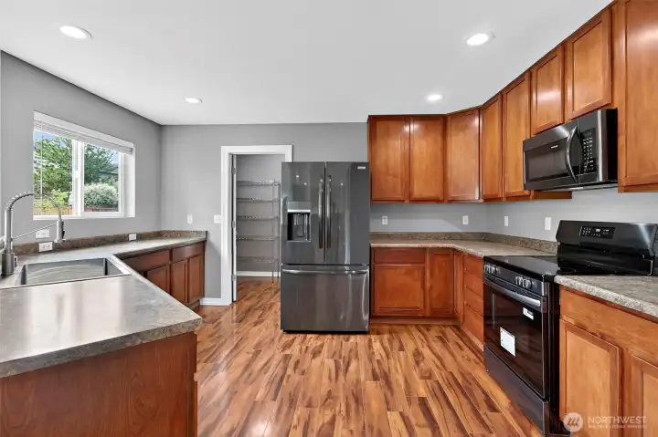 New kitchen sink, faucet, fridge and stove