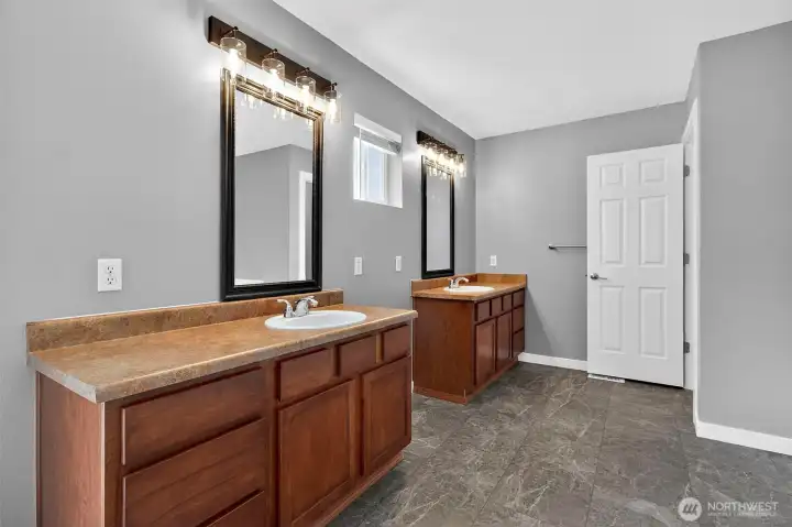 Double sinks, re-stained cabinetry May 2026