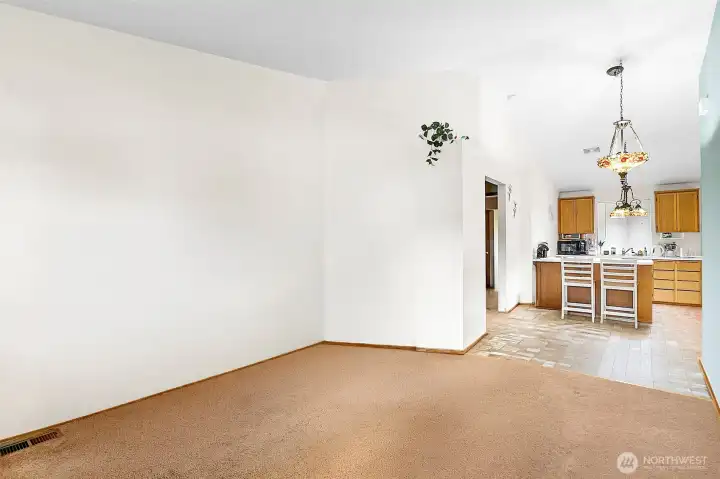 Living room in Unit A is nice sized. Photo has been de-staged for tenant privacy
