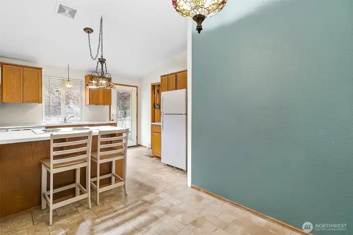 Good sized kitchen in Unit A. Photo has been de-staged for tenant privacy
