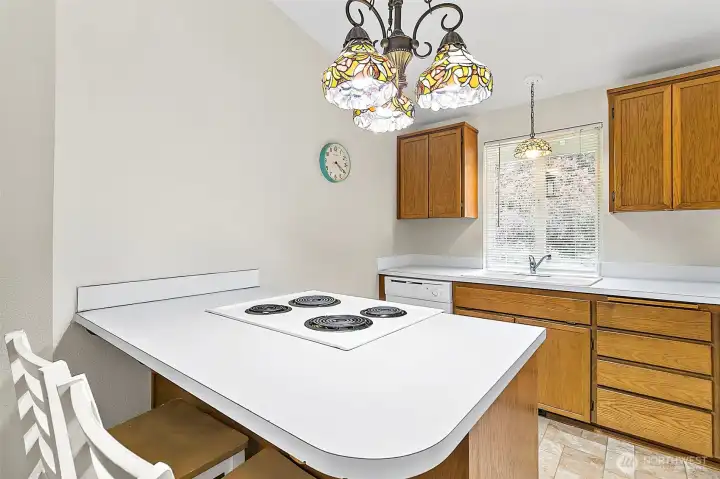 Another view of the Kitchen in unit A. Counter tops will be re-done. Photo has been de-staged for tenant privacy