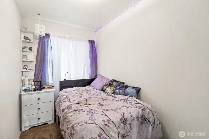 Second bedroom in Unit A. Photo has been de-staged for tenant privacy