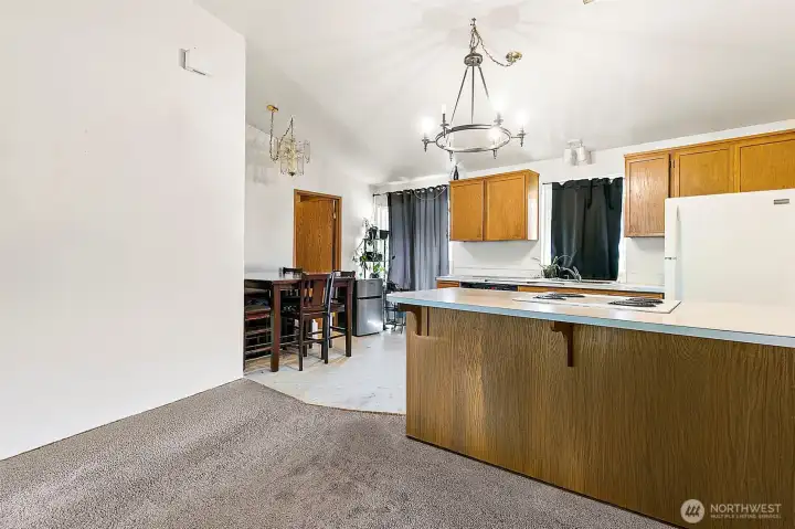 Good sized kitchen in Unit B. Photo has been de-staged for tenant privacy
