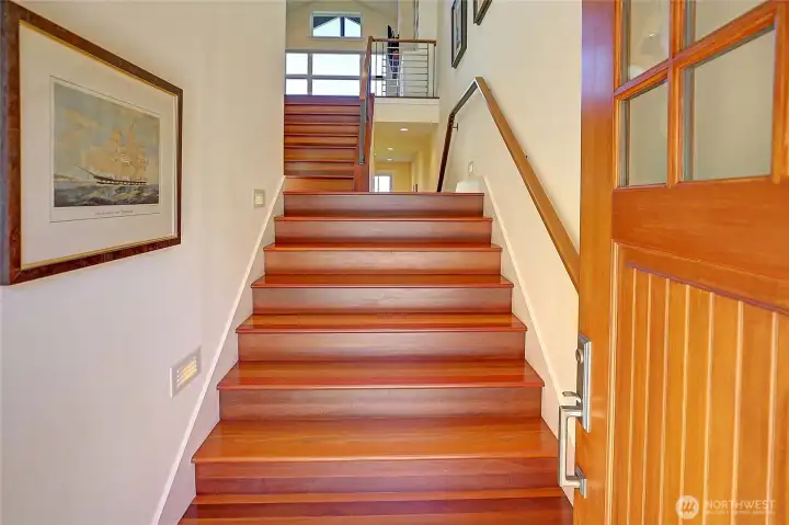 No step entry to ground level via the garage.  Staired entry via front door.