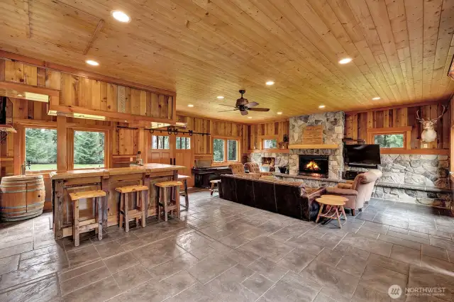 Fun Fun Fun! Outdoor living space for entertaining! Beautiful warm woods and rock accents.