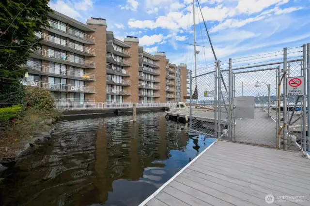 Spinnaker Bay’s waterfront setting is front and center—an ever-changing view of boats, reflections, and coastal sky just beyond your door.