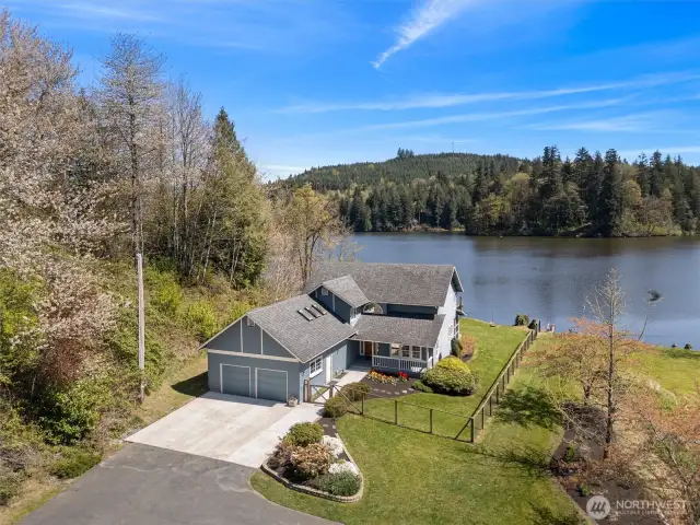 Welcome to your new lakefront estate!  With 5+ acres, a shop and a dock, what more could you ask for?