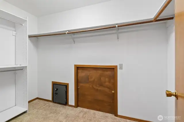 Large walk-in closet in primary bedroom.