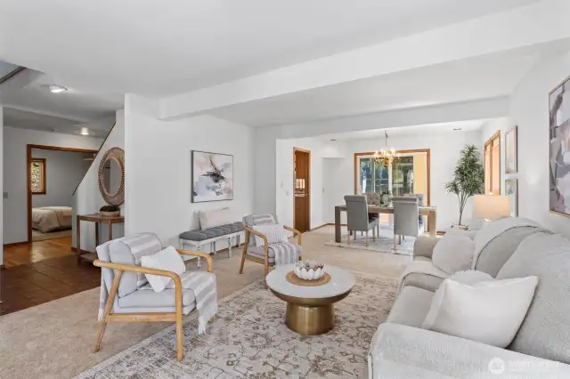 Formal living room off the main entry with views of the water.