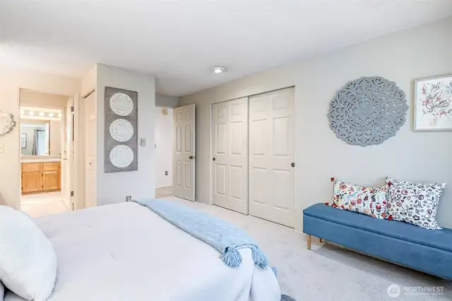 Primary bedroom features plenty of closet space, and brand new carpet.