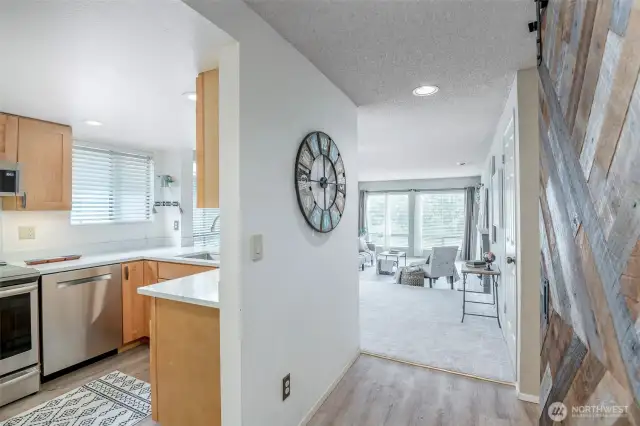Upon entry, you'll be greeted by the kitchen on your left!