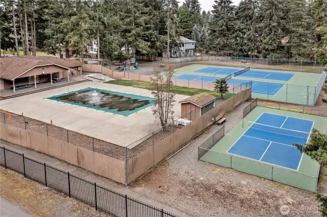 The private, gated Gem Club offers a refreshing pool and tennis courts. It's a perfect spot to stay active.
