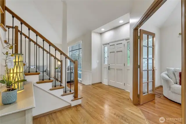 The large and inviting foyer sets the tone for the rest of the home, welcoming guests with warmth and style. Its open design offers a grand first impression.