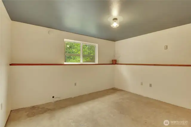 One side of the downstairs bedroom.