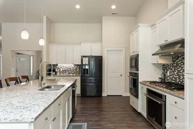 Double ovens and gas stove.