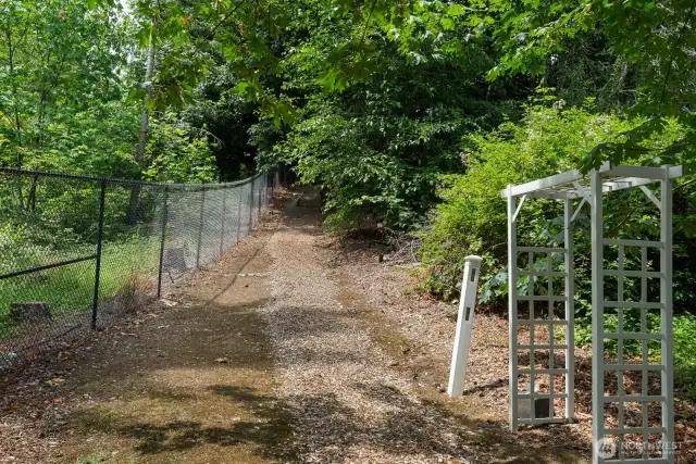One of the neighborhood trails behind the house. Low HOA dues at $650 per year and $200 for the beach rights.