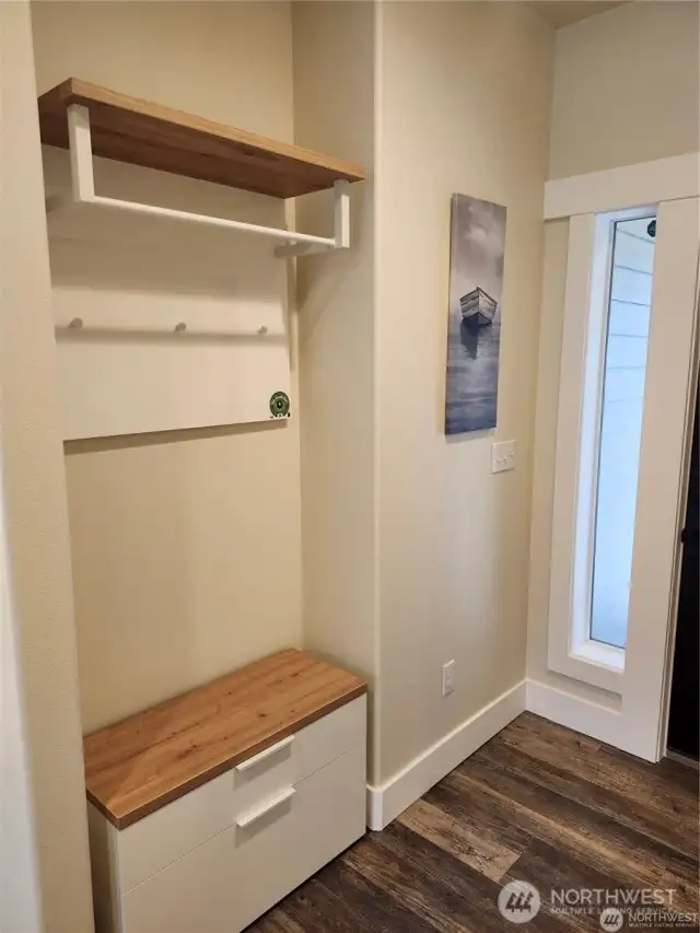 Entry with shoe cabinet and hanging storage
