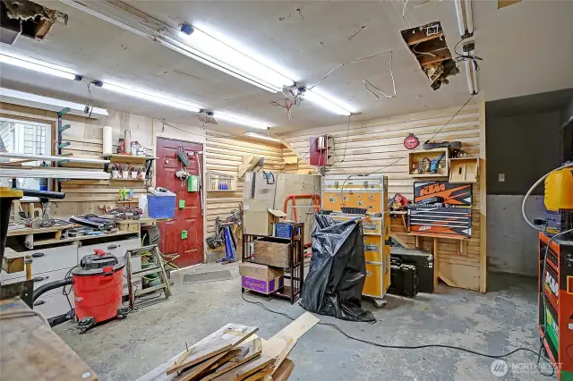Current garage space is being used for a wood shop and can easily be converted back to a garage for your vehicle