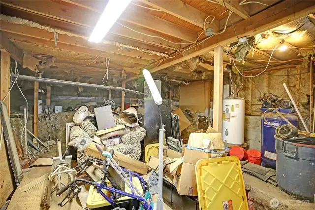 Large crawlspace just off the garage.  Complete the owners vision of finishing the area for additional living space.
