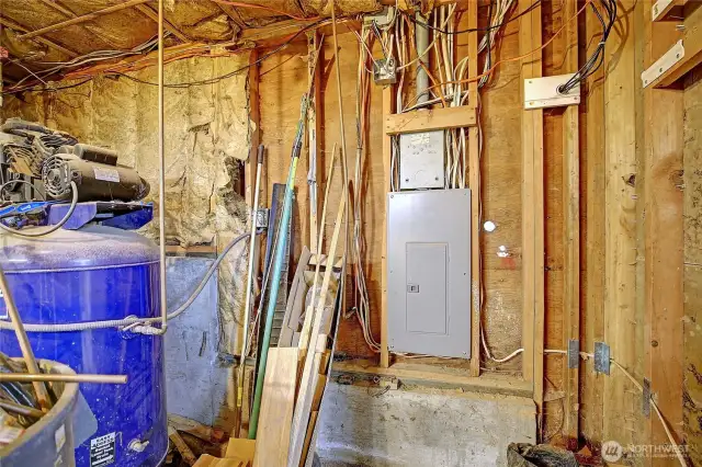 Electrical panel in the crawlspace, just off the garage.