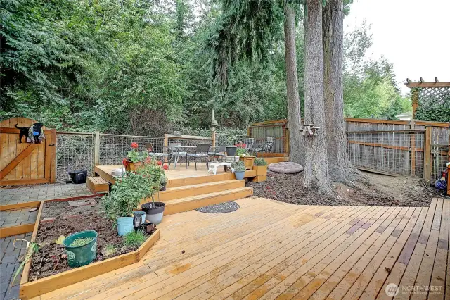 Nice multi-level deck in the private backyard is great for entertaining guests.