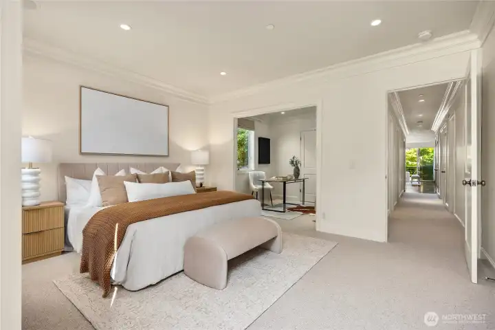 Looking back at the bedroom, you can see the adjoining den off of the primary bedroom, and the hallway that leads to the dayrooms.
