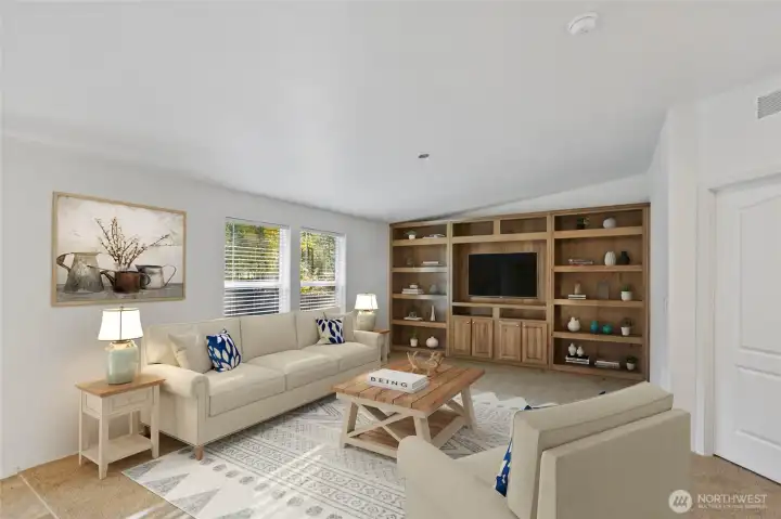 Built in bookshelves make this room warm and welcoming