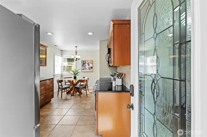 Updated kitchen with ceramic tile floors and dining room.