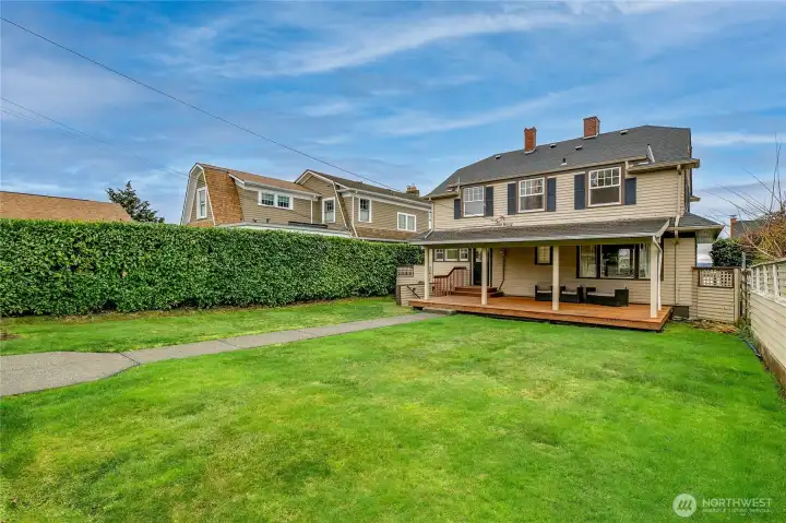 Paved walkway to detached garage.