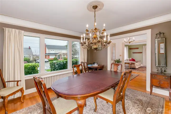 Formal dining room to the right as you enter the home.  Some view of Puget Sound between the bluff homes across the street.