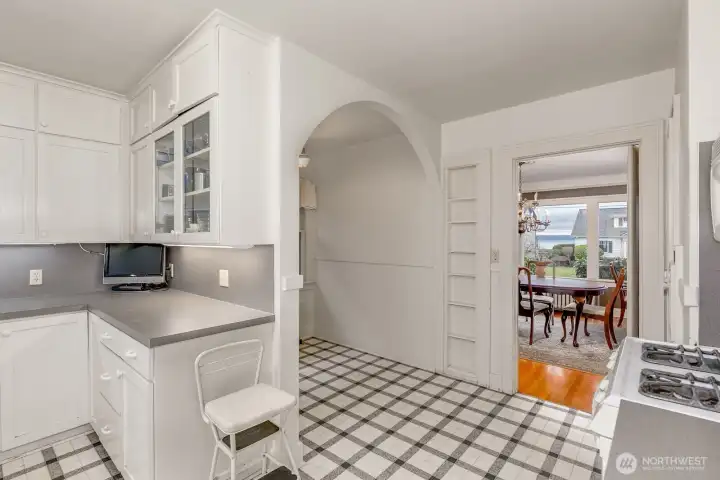 Breakfast nook between kitchen and formal dining room.