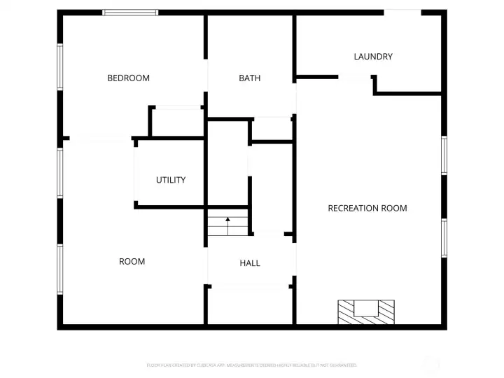 Basement floor plan with exit door in laundry room.