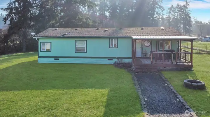 Front of home with covered deck