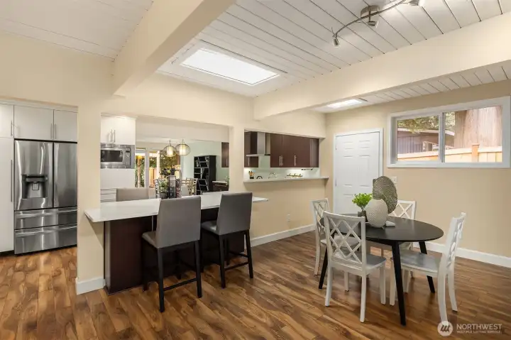 Large counter seating on both sides with storage below.