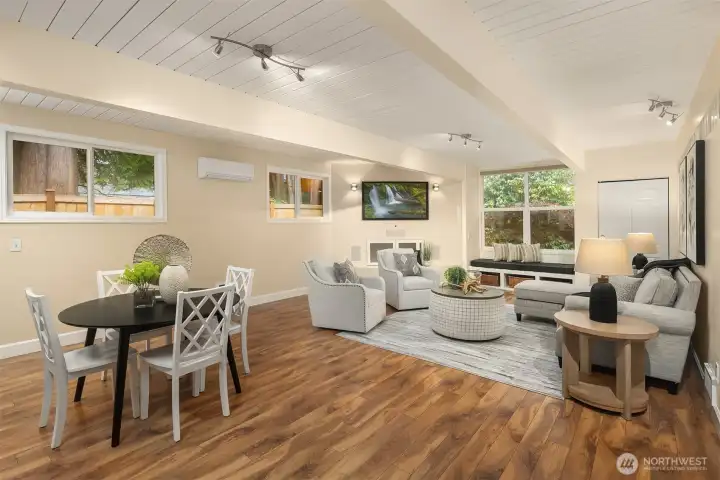 There is a hidden entertainment center with built in speakers below the flat screen tv. Note the mini-split installed for localized heating and cooling.