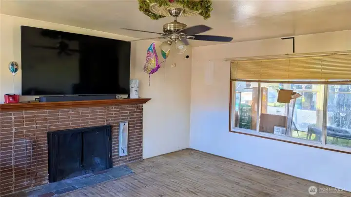 Fireplace - Lots of Natural Light throughout house
