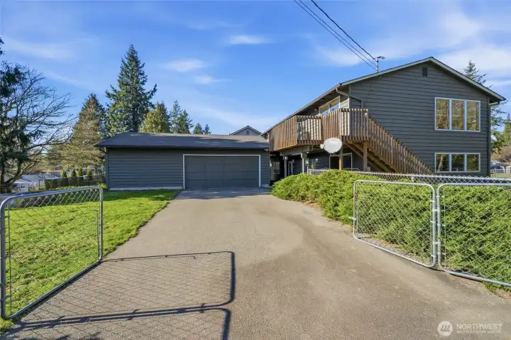 Detached 575 sq ft shop/garage offering excellent flexibility for parking, storage, hobbies, or workspace.