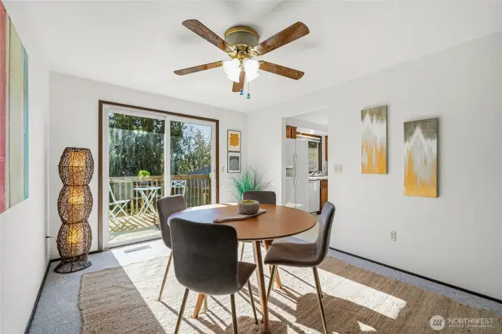 Sliding glass door off the dining area opens to the deck, creating an easy indoor-outdoor connection.