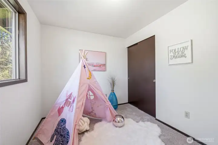 Inviting bedroom providing convenience and versatility.